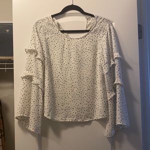 Black polka dot bell sleeve shirt